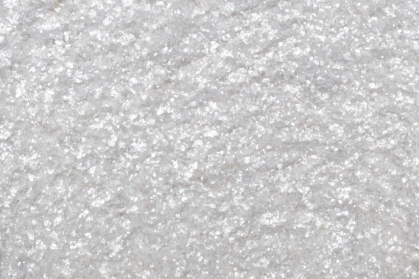 Blurred white glitter background. Sparkling and shimmering texture. — Stockfoto