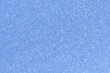 Beautiful and eye catching light blue colored glitter background.
