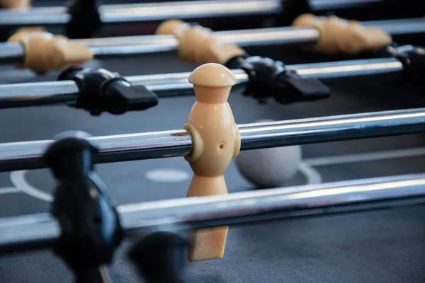 Foosball for entertainment, leisure and activity.