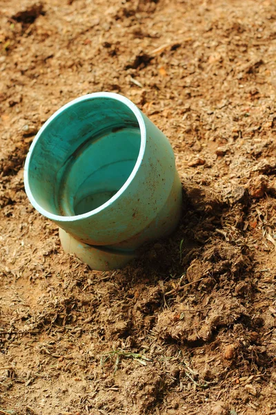 PVC pipe blue - on the ground. — Stock Photo, Image