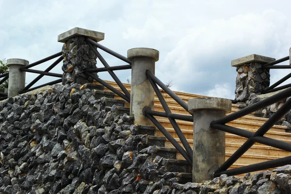 Vintage staircase and stone wall — Stock Photo, Image