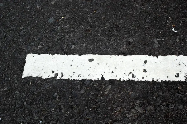 Línea blanca en la textura del camino — Foto de Stock