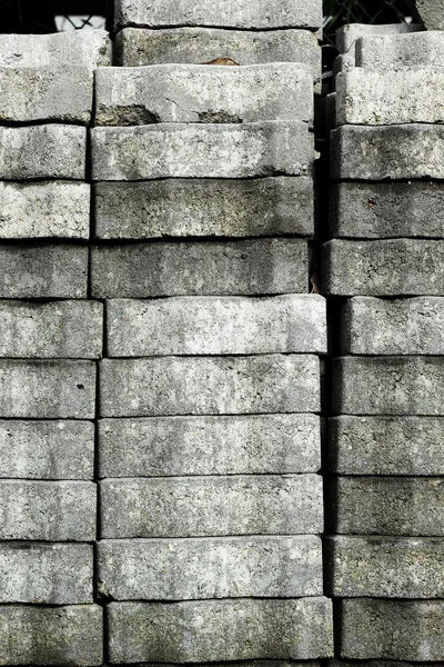 Grijze bakstenen voor bouw achtergrondstructuur — Stockfoto