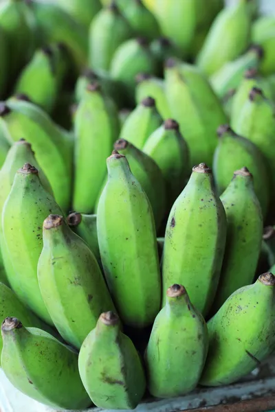 Green banana fruits in the market. — Stock Photo, Image