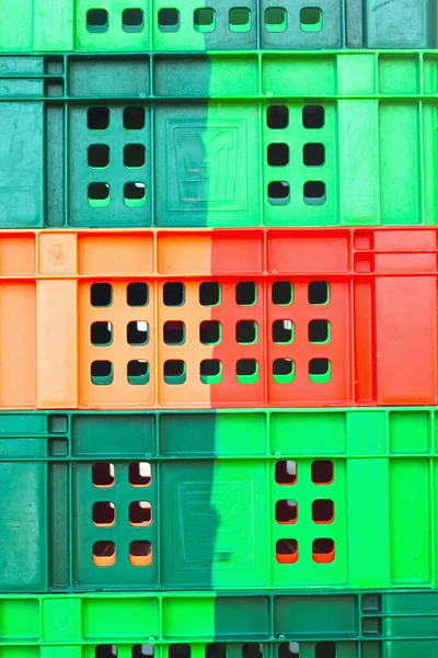 Colorful plastic - stacked packing containers. — Stock Photo, Image