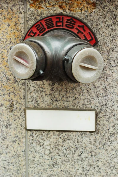 Red Fire Hydrant on the wall - Korea — Stock Photo, Image