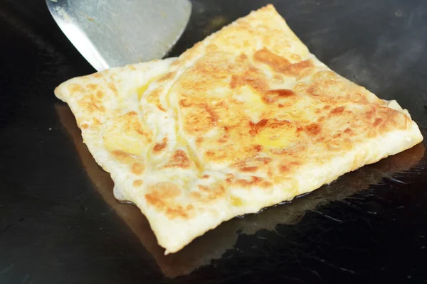 Southern flat bread fried on a pan. — Stock Photo, Image