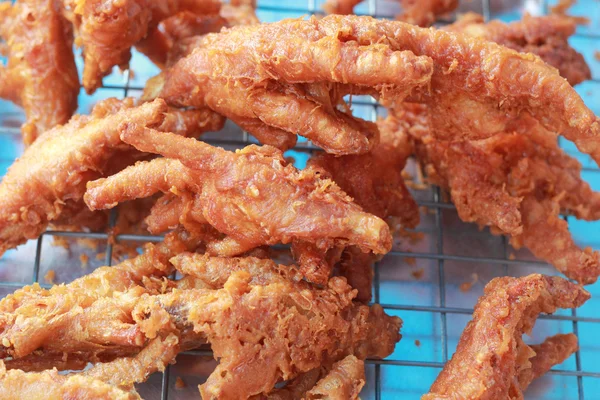 Close up van gebakken kip benen — Stockfoto