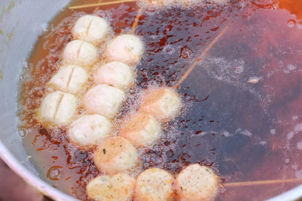 Meatballs frying in a pan — Stock Photo, Image