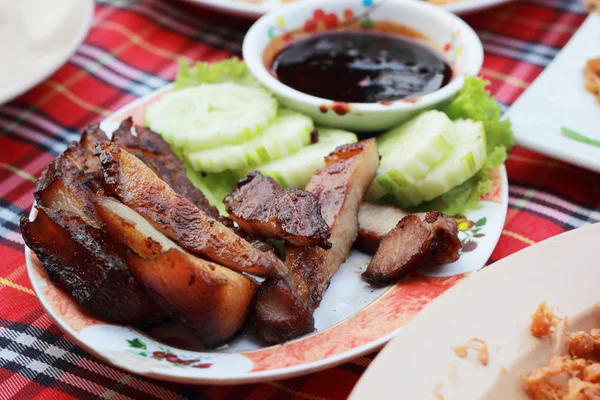 Roast pork with sauce on plate. — Stock Photo, Image