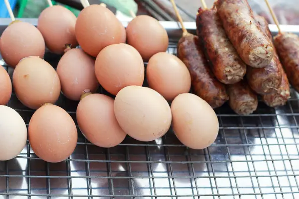 Grilled chicken eggs on the stove. — Stock Photo, Image