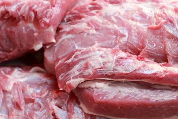 Carne de porco crua no mercado — Fotografia de Stock