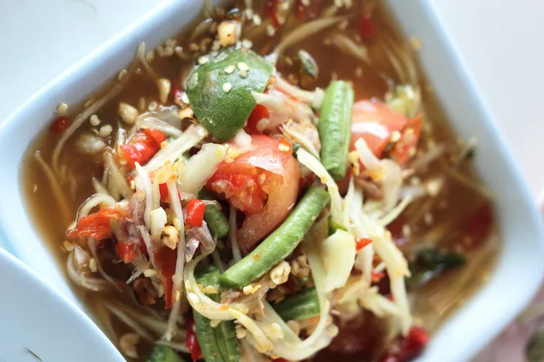 Papaya salad in a dish — Stock Photo, Image