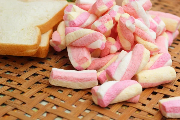 Fresh milk and pink marshmallows with a slice of bread. — Stock Photo, Image