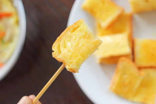 Toast with butter and sprinkling with sugar. — Stock Photo, Image