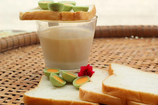 Fresh milk and bread plate with chocolate green. — Stock Photo, Image