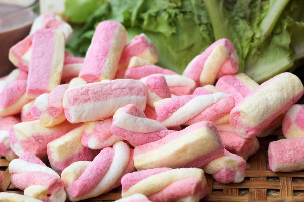 Vegetables salad, tomato and pink marshmallows. — Stock Photo, Image