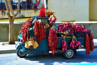 Tropea red chillies and onions italy clipart