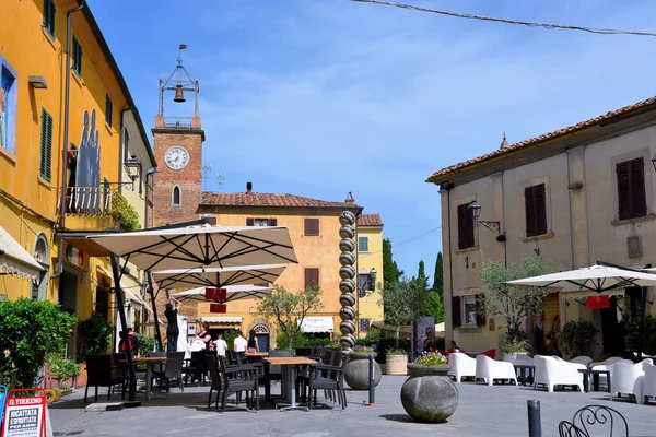 piazza Vittorio veneto the castle and the clock tower June 4 2022 Lajatico Italy