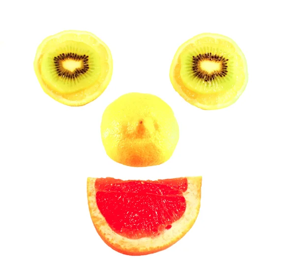 Visage souriant aux fruits — Photo