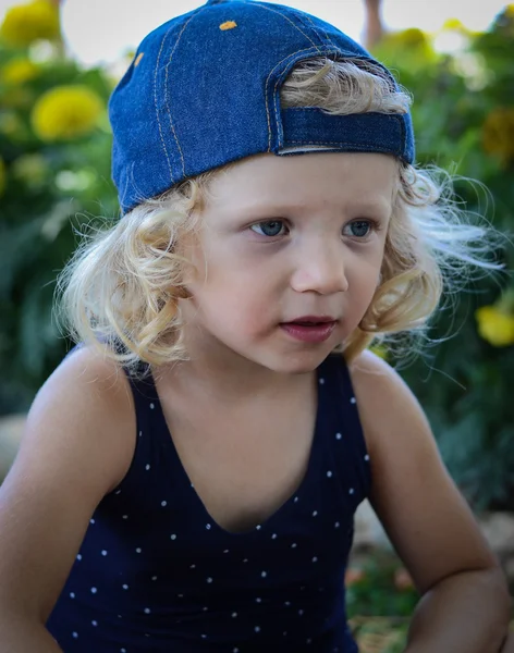 Blond girl in a hat — Stock Photo, Image