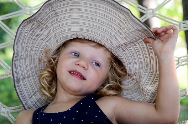 Girl with hut — Stock Photo, Image