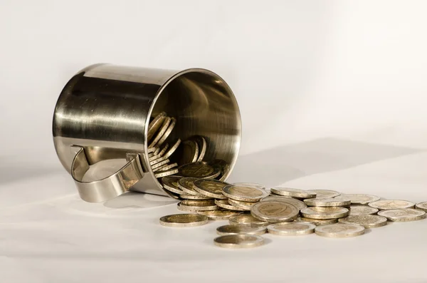 Coins in glass — Stock Photo, Image