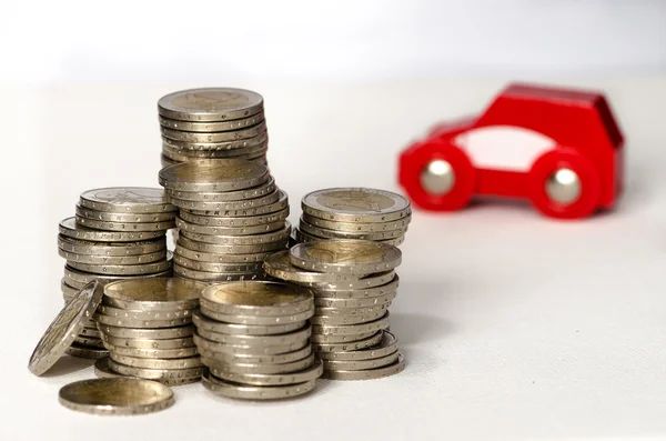 Coins and car — Stock Photo, Image