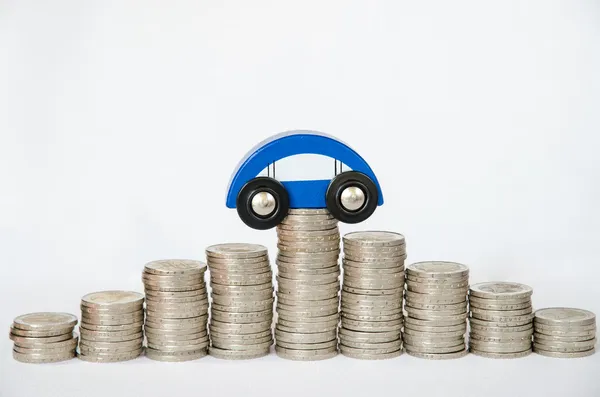 Coins and car — Stock Photo, Image