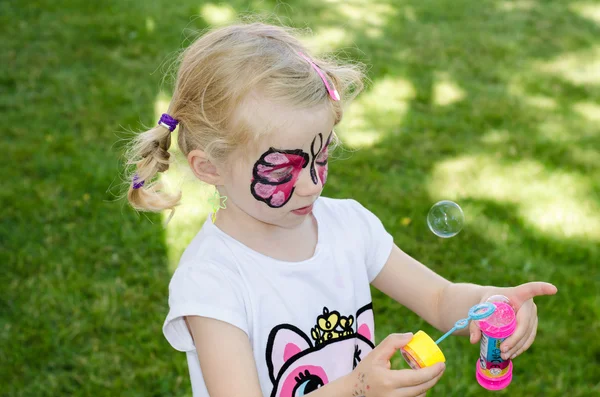 Child with face painting — Stock Photo, Image