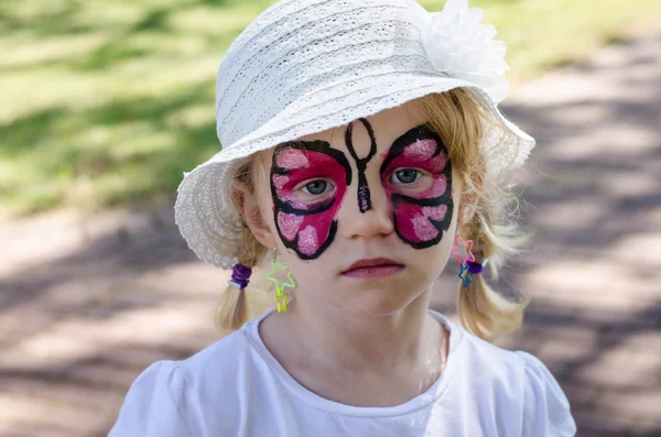 Niño con pintura facial — Foto de Stock