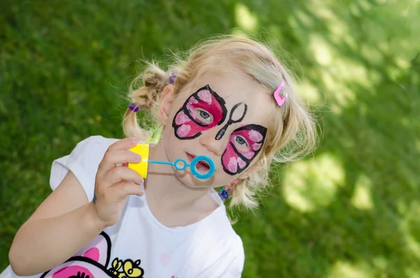 Child with face painting Stock Photo