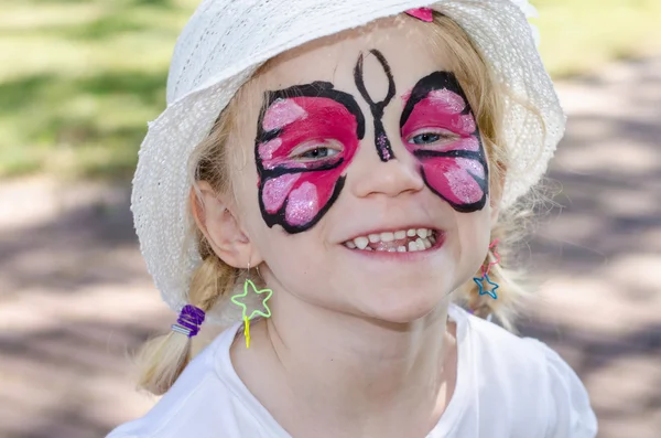 Child with face painting Royalty Free Stock Images