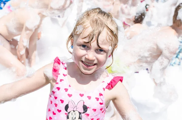 Criança e espuma festa — Fotografia de Stock