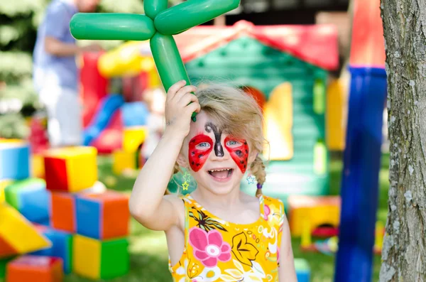 Child with face painting — Stock Photo, Image