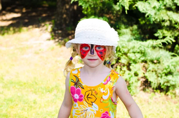 Child with face painting — Stock Photo, Image