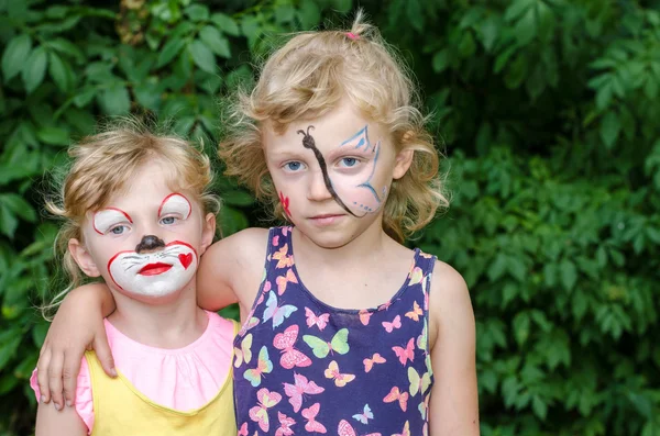 Criança com pintura facial — Fotografia de Stock