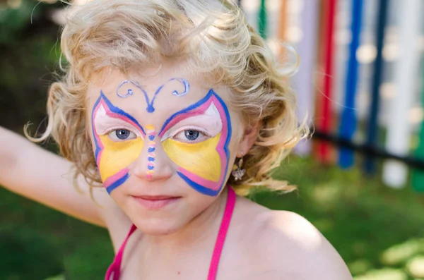 Girl with face painting Stock Image