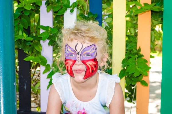 Girl with butterfly face painting Stock Photo