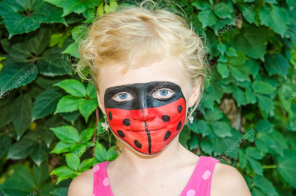 Lady bug faces Ladybug face painting — Stock Photo © KatarinaGondova 49755345
