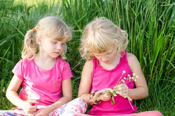 Blond girls on grass — Stock Photo, Image