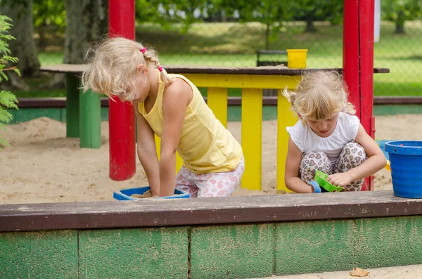 Menina no parque infantil — Fotografia de Stock