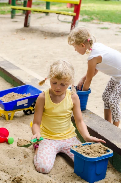 Menina no parque infantil — Fotografia de Stock