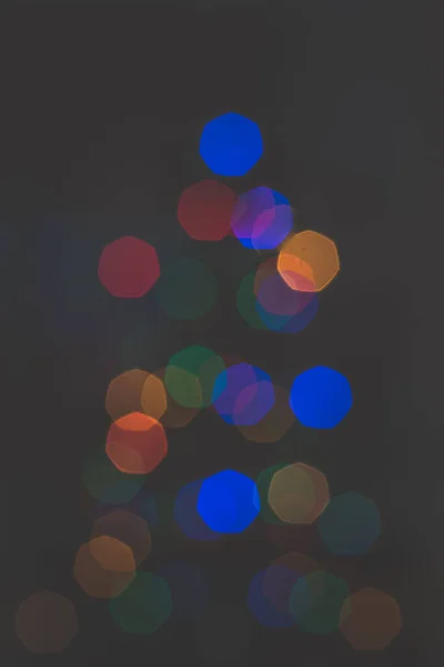Blurred Christmas Tree Shape Colorful Bauble Lights — Stock Photo, Image