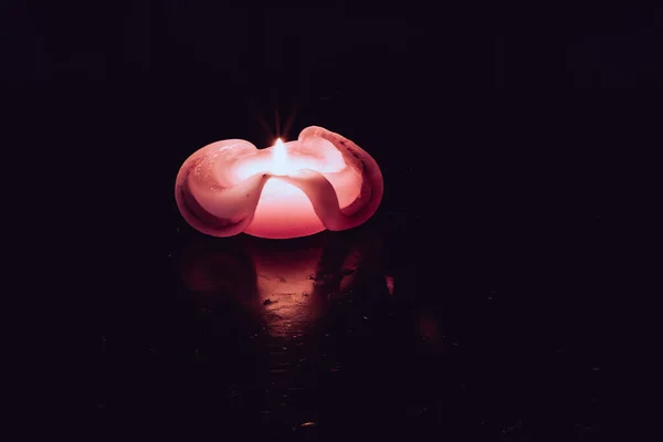 One Festive Burning Candle Black — Stock Photo, Image