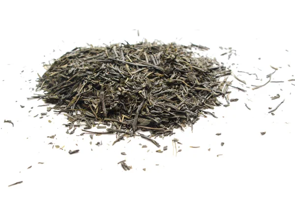 Photo of green bulk tea on a white background — Stock Photo, Image