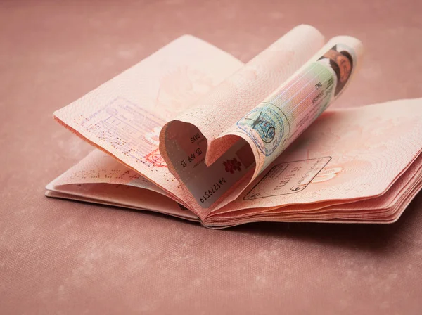 Passport pages in shape of heart — Stock Photo, Image