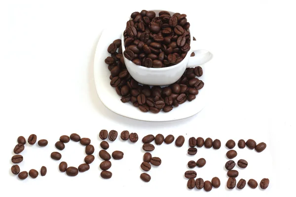 Grano de café en la taza — Foto de Stock