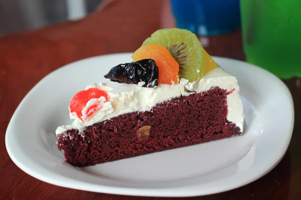Colorful mix fruit chocolate cake — Stock Photo, Image