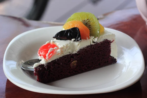 Colorful mix fruit chocolate cake — Stock Photo, Image